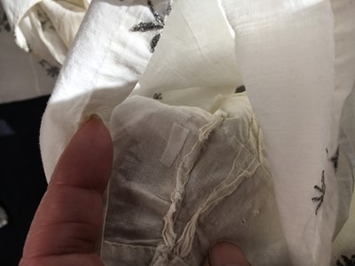 Lot 33 - A white cotton gown with silver Indian embroidery with pointed train, German, 1803-1805