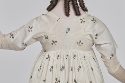 Lot 33 - A white cotton gown with silver Indian embroidery with pointed train, German, 1803-1805