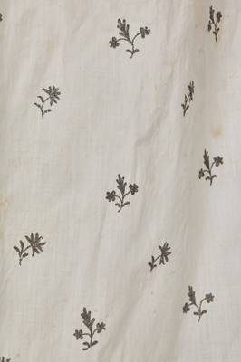 Lot 33 - A white cotton gown with silver Indian embroidery with pointed train, German, 1803-1805