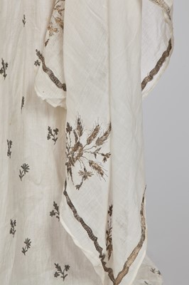 Lot 33 - A white cotton gown with silver Indian embroidery with pointed train, German, 1803-1805