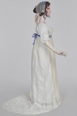 Lot 4 - A white linen and lace gown with long train American, circa 1798-1800