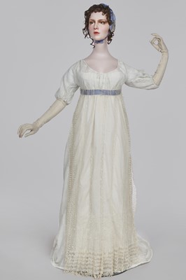 Lot 4 - A white linen and lace gown with long train American, circa 1798-1800