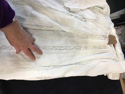Lot 4 - A white linen and lace gown with long train American, circa 1798-1800
