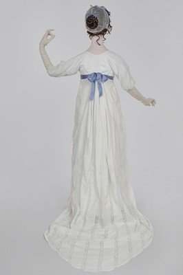 Lot 4 - A white linen and lace gown with long train American, circa 1798-1800