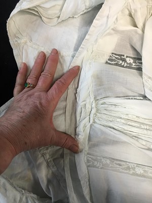 Lot 4 - A white linen and lace gown with long train American, circa 1798-1800