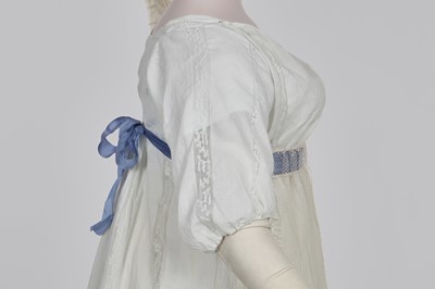 Lot 4 - A white linen and lace gown with long train American, circa 1798-1800