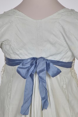 Lot 4 - A white linen and lace gown with long train American, circa 1798-1800