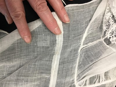 Lot 39 - A fine Indian muslin evening dress with long train, English, 1804-05