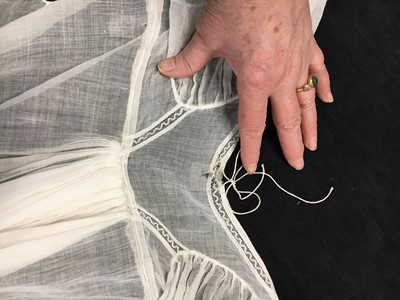 Lot 39 - A fine Indian muslin evening dress with long train, English, 1804-05