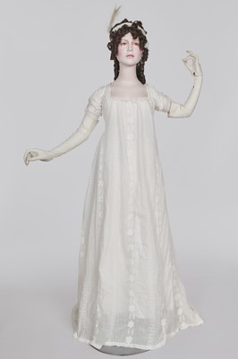 Lot 31 - A whitework embroidered muslin gown with long train, French, circa 1800