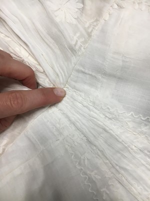 Lot 31 - A whitework embroidered muslin gown with long train, French, circa 1800