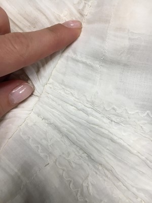 Lot 31 - A whitework embroidered muslin gown with long train, French, circa 1800