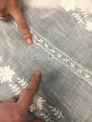 Lot 31 - A whitework embroidered muslin gown with long train, French, circa 1800