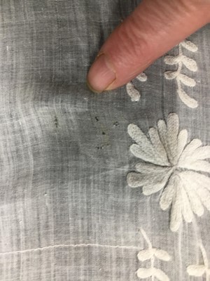 Lot 31 - A whitework embroidered muslin gown with long train, French, circa 1800