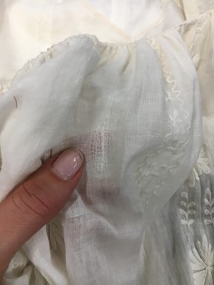 Lot 31 - A whitework embroidered muslin gown with long train, French, circa 1800