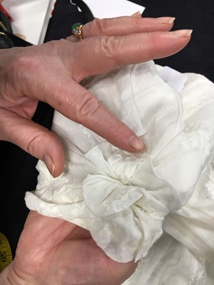 Lot 31 - A whitework embroidered muslin gown with long train, French, circa 1800