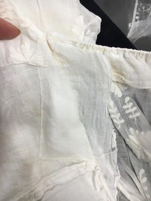 Lot 31 - A whitework embroidered muslin gown with long train, French, circa 1800