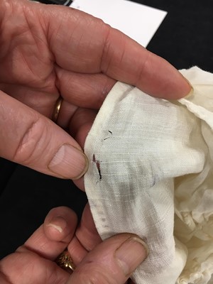 Lot 31 - A whitework embroidered muslin gown with long train, French, circa 1800