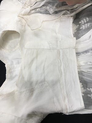 Lot 31 - A whitework embroidered muslin gown with long train, French, circa 1800