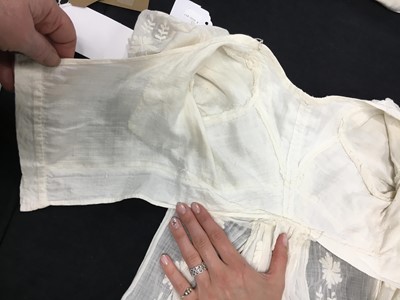 Lot 31 - A whitework embroidered muslin gown with long train, French, circa 1800