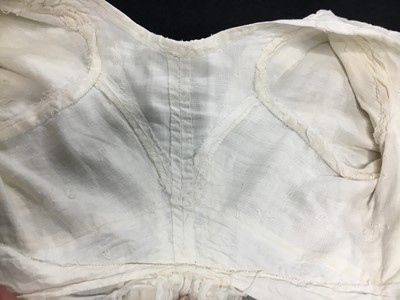 Lot 31 - A whitework embroidered muslin gown with long train, French, circa 1800