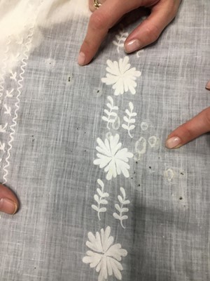 Lot 31 - A whitework embroidered muslin gown with long train, French, circa 1800