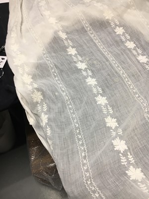 Lot 31 - A whitework embroidered muslin gown with long train, French, circa 1800