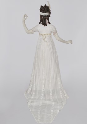 Lot 31 - A whitework embroidered muslin gown with long train, French, circa 1800