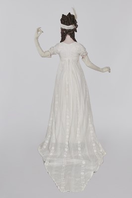 Lot 31 - A whitework embroidered muslin gown with long train, French, circa 1800