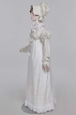 Lot 105 - A white cotton spencer, circa 1815