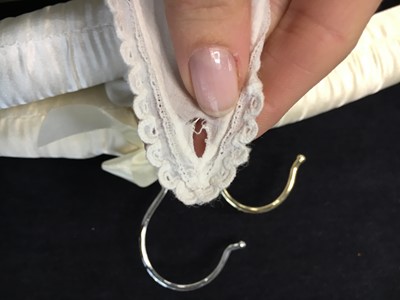 Lot 105 - A white cotton spencer, circa 1815