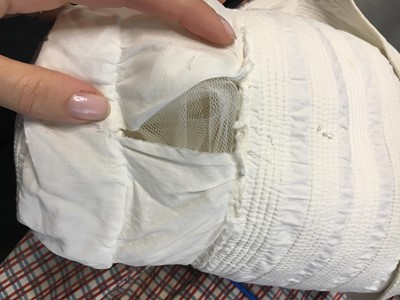 Lot 105 - A white cotton spencer, circa 1815