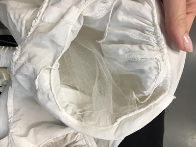 Lot 105 - A white cotton spencer, circa 1815