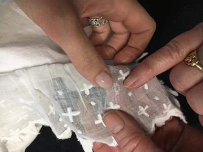 Lot 105 - A white cotton spencer, circa 1815