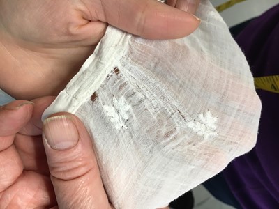 Lot 105 - A white cotton spencer, circa 1815