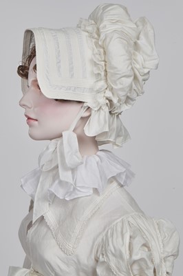 Lot 105 - A white cotton spencer, circa 1815