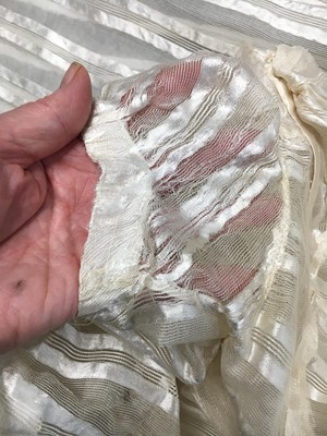 Lot 89 - An ivory striped silk gauze ball gown, English, circa 1812