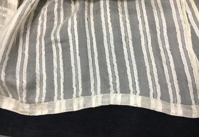 Lot 89 - An ivory striped silk gauze ball gown, English, circa 1812