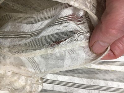 Lot 89 - An ivory striped silk gauze ball gown, English, circa 1812