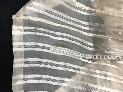 Lot 89 - An ivory striped silk gauze ball gown, English, circa 1812