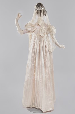 Lot 89 - An ivory striped silk gauze ball gown, English, circa 1812