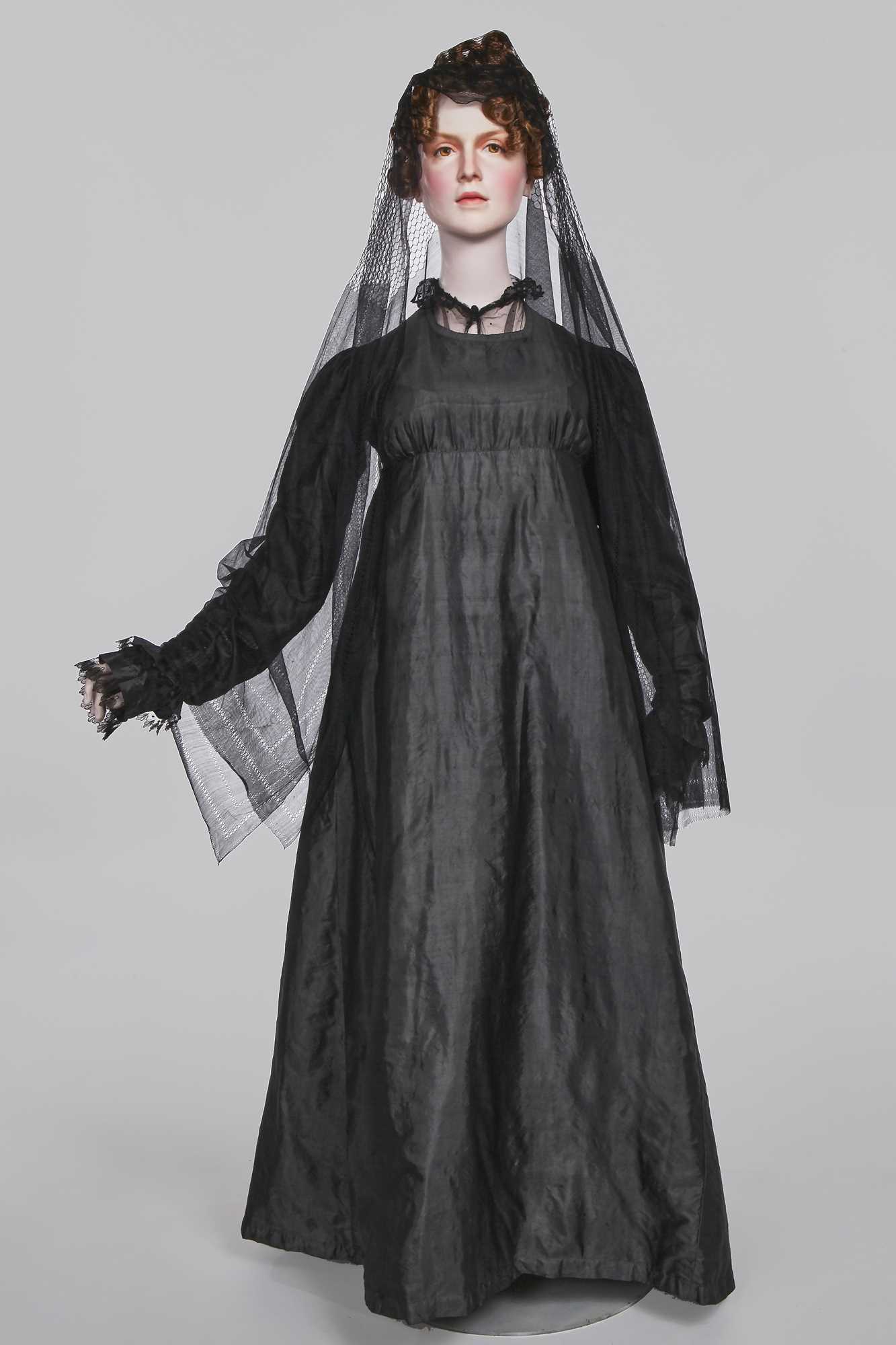 Lot 97 - A sarsanet mourning gown, French, circa 1813