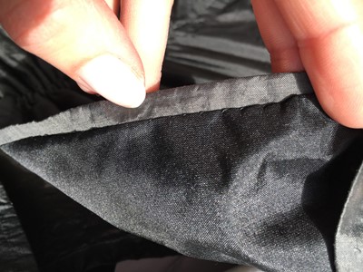 Lot 97 - A sarsanet mourning gown, French, circa 1813