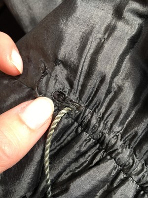 Lot 97 - A sarsanet mourning gown, French, circa 1813