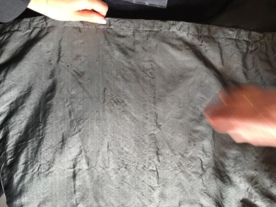 Lot 97 - A sarsanet mourning gown, French, circa 1813