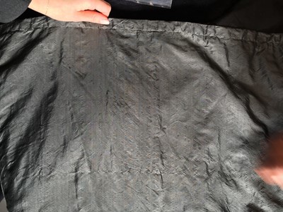 Lot 97 - A sarsanet mourning gown, French, circa 1813