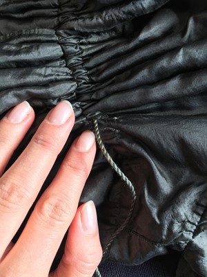 Lot 97 - A sarsanet mourning gown, French, circa 1813