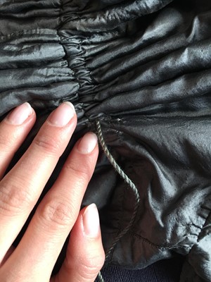 Lot 97 - A sarsanet mourning gown, French, circa 1813