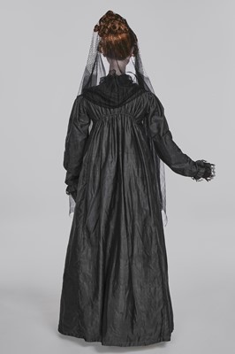 Lot 97 - A sarsanet mourning gown, French, circa 1813