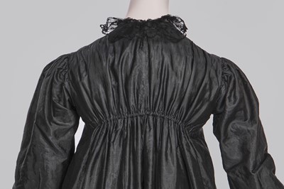 Lot 97 - A sarsanet mourning gown, French, circa 1813